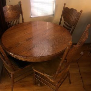 wood extendable table with 4 chairs included
